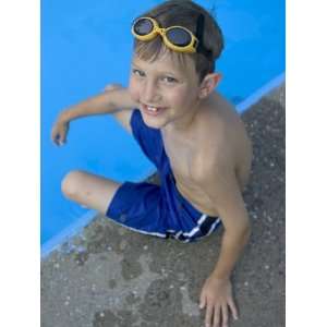  Portrait of 9 Year Old Boy Sitting at the Edge of the 