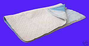 NEW reusable waterproof bed pads 35x33 w/ tuck in  