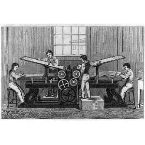  Man and 3 apprentices setting type on printing press