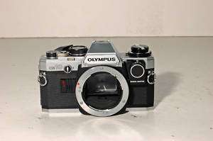 Olympus OM10 camera body w/ manual adapter rated B   