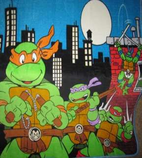   soft Licensed TMNT Turtles in the City Micro Raschel Throw Blanket