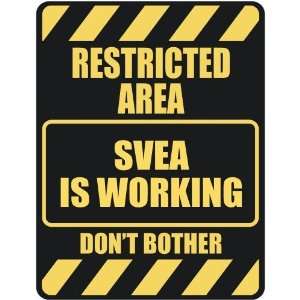   RESTRICTED AREA SVEA IS WORKING  PARKING SIGN