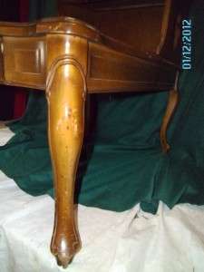   LEATHER TOP STEP END TABLE WITH CABRIOLE LEGS AND CURVED OUT SIDES