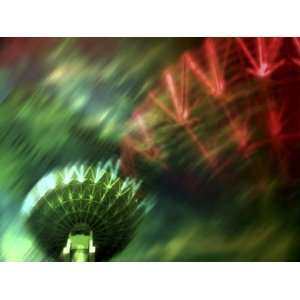  Motion Blur of Bright Carnival Lights on Spinning Rides 