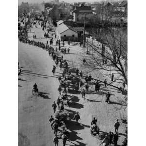  Nationalist Chinese Soldiers Marching Through City Street 