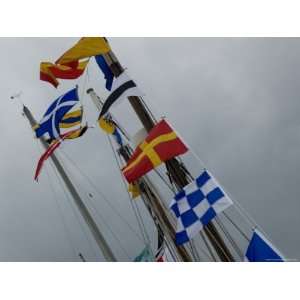 Nautical Flags Hanging from the Wooden Mast of a Sailing Ship, Mystic 