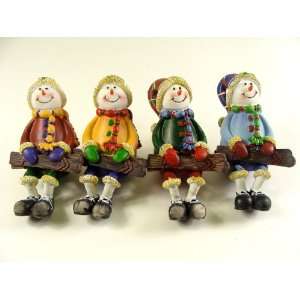  Club Pack of 48 Sitting Snowman With Skis Table Top 