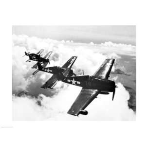  angle view of four fighter planes flying in formation, F6F Hellcat 