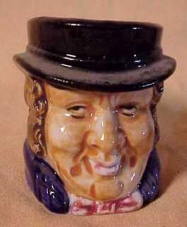   character jug or mug in the design of a smiling english gentleman this