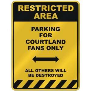 RESTRICTED AREA  PARKING FOR COURTLAND FANS ONLY  PARKING SIGN NAME