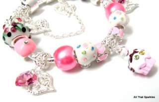   silver plated 17cm charm bracelet with pandora style charms and beads