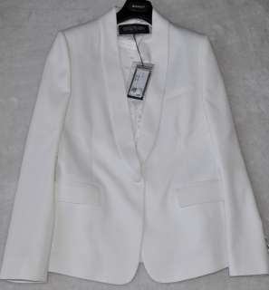   , swap your black tuxedo jacket for Balmains bright white version