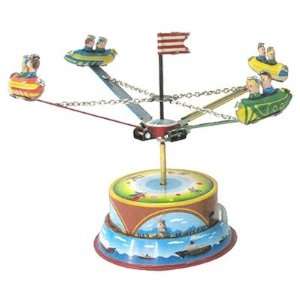  Tin lever wind carousel with two riders figurine