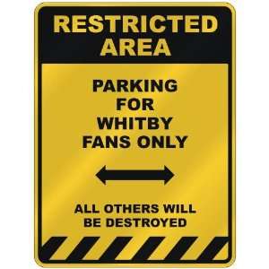  RESTRICTED AREA  PARKING FOR WHITBY FANS ONLY  PARKING 