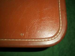 UP FOR AUCTION FROM RECENT SALE IS THIS TAPERLITE FAUX LEATHER 