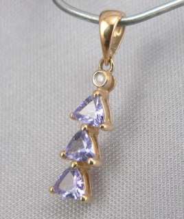 Gemstones  This item is detailed with 3 Trilliant cut Tanzanite 