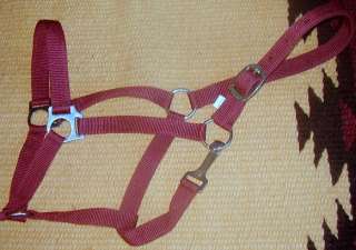 Nylon halter features double ply nylon throughout. Features quick snap 