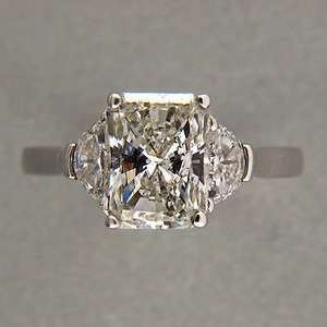 33CT IDEAL RADIANT CUT WHITE DIAMOND GIA H, SI2 .60CT HALF MOON RING 