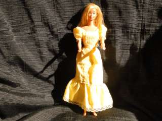 Barbie 1966 (yellow dress) Made in Hong Kong.  