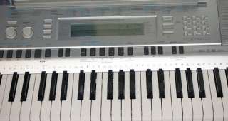 CASIO WK 210 76 Key Touch Sensitive Keyboard Piano w/Bench  SIlver 
