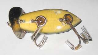 Heddon Crab Wiggler. 2.75 Wood. Glass eyes, one cracked. Used, small 