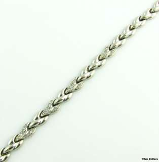   gold this lovely bracelet features a wheat chain design the chain is