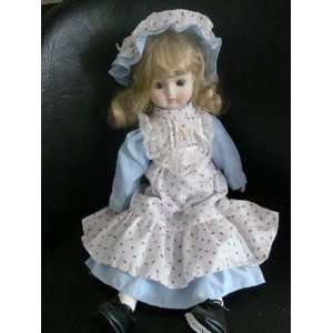  PORCELAIN 15 DOLL WITH STAND 