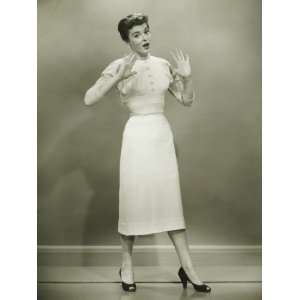  Young Woman Standing in Empty Room, Gesturing Photographic 
